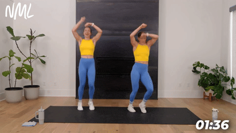 two women demonstrating speedbags in a bodyweight cardio workout