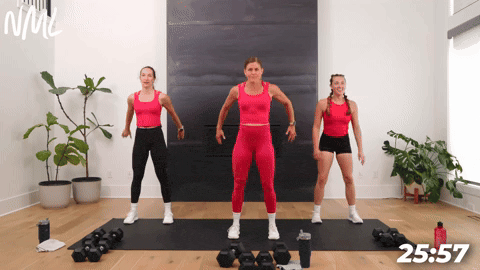 three women demonstrating how to perform an air squat to squat jump in an at home circuit workout
