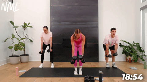 three people performing alternating back rows in a full body dumbbell workout