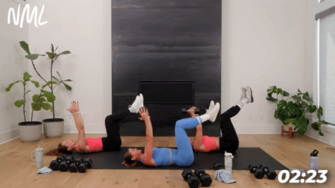 three women demonstrating a dead bug exercise in a 20 minute strength workout