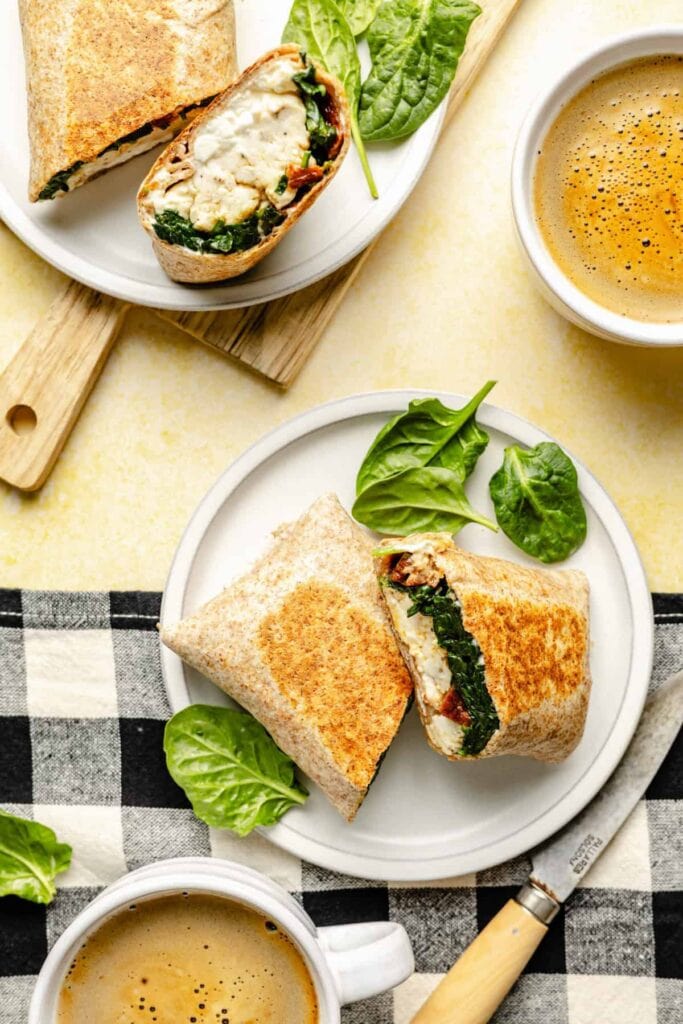 Copycat Starbucks Egg White Breakfast Wrap with eggs, spinach, tomatoes and cheese.
