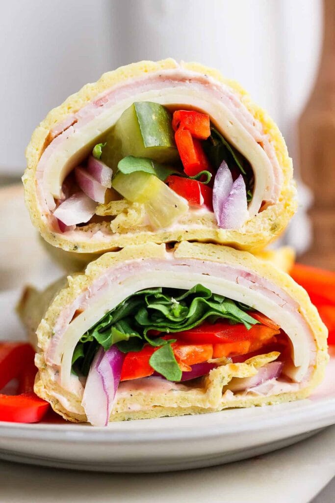 High-Protein Cottage Cheese Wraps with deli meat, cucumber, onions, peppers and cottage cheese.