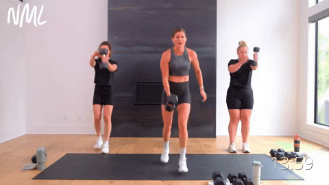 One women performing step back lunge swings. Two women performing dumbbell lunge drops.