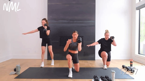 Two women performing knelling hinge swing stand and knee drive. One women performing standing dumbbell swing into a knee drive.