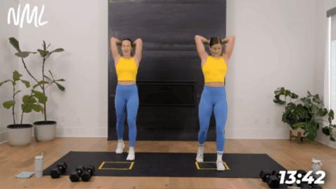 example of how to perform an overhead tricep extension as part of cardio strength workout