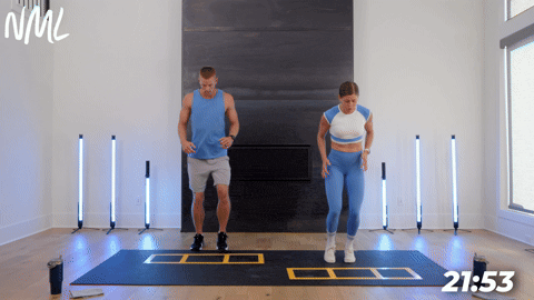 two people demonstrating in and out runs as part of agility training in a cardio and core workout