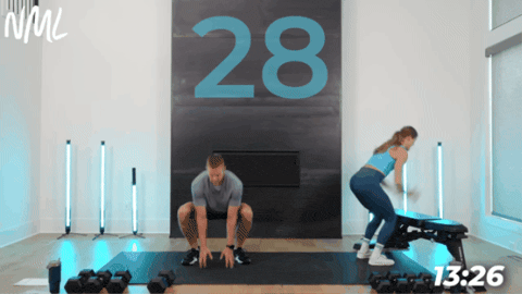 woman performing box jumps while man performs squat jumps as part of chest and legs workout