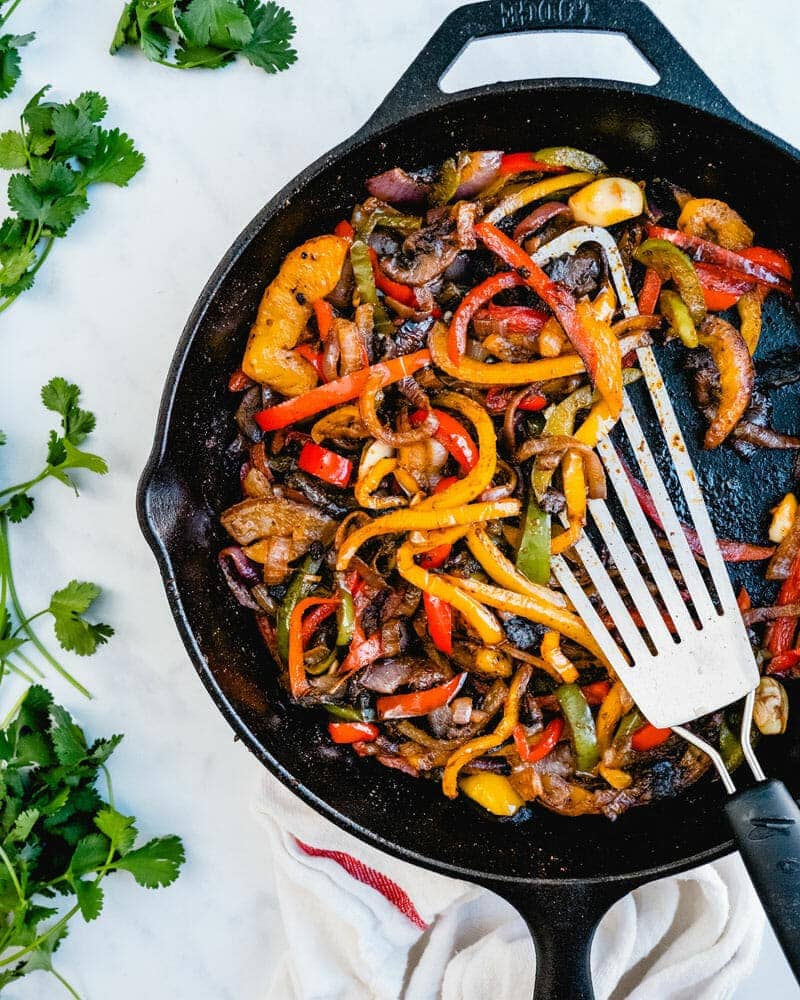 Vegetarian Fajitas with peppers, onion, mushrooms, pinto beans and fajita sauce.