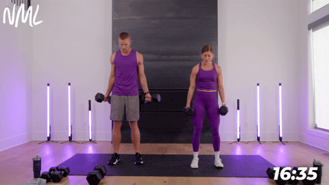 Male and female performing standard bicep curls.