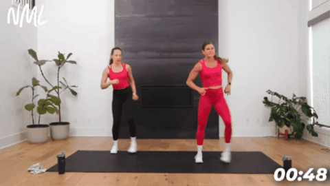 adult women performing lateral lunges