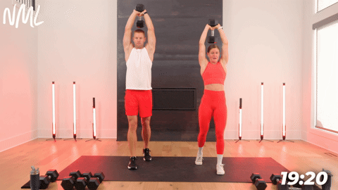 two people demonstrating overhead tricep extensions in a full body shred workout