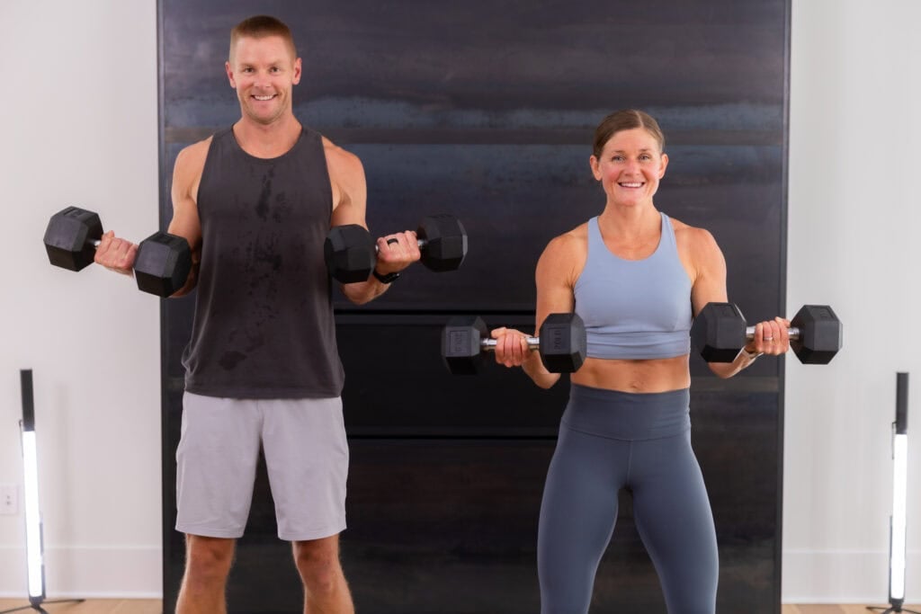 two people performing bicep curls in a back and bicep workout