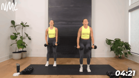 women performing lateral raises as part of home workout