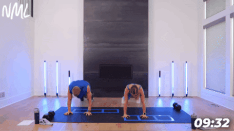 demonstration of lateral bear crawl to target abs