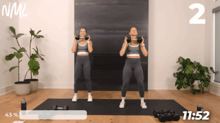 women performing an overhead press as part of Exercise After Being Sick workout routine