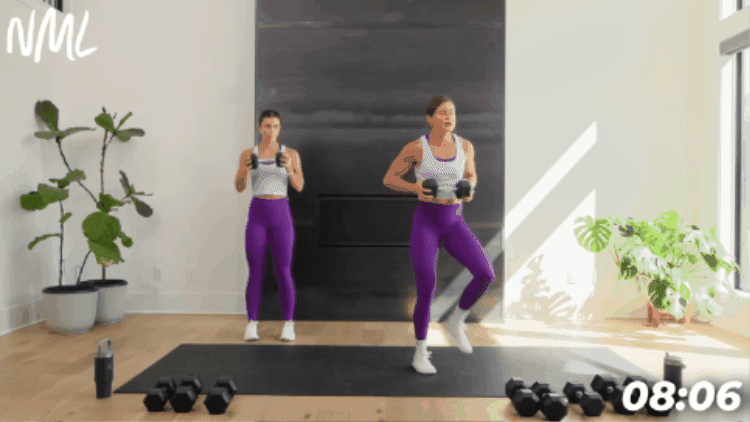 women performing a pivot and press out to target shoulders and core