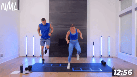 wife and husband performing single leg hops as example of agility exercise at home