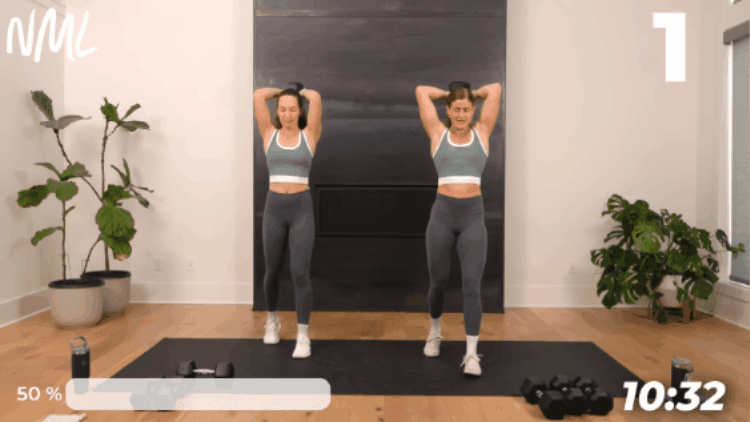 demonstration of overhead tricep extension in workout I do after being sick