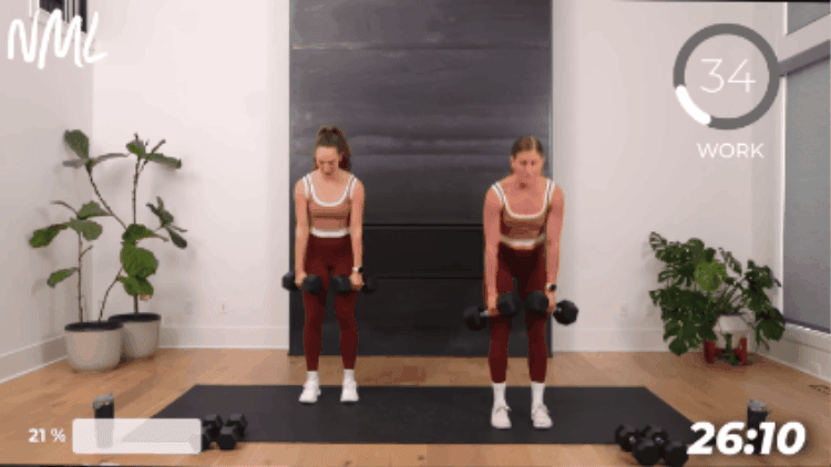 demonstration of romanian deadlift with calf raise as part of 30 minute full body workout