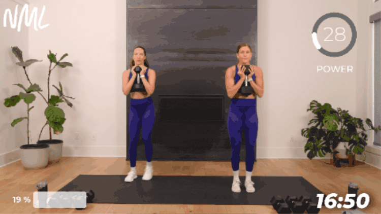 women performing a goblet squat jack as part of superset leg workout