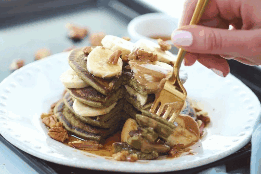 spinach banana pancakes with milk, rolled oats, banana, eggs, spinach, ground flaxseed, cinnamon, protein powder.