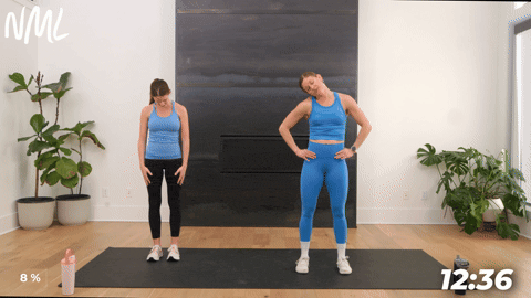 two women performing neck rolls as part of the best lymphatic drainage exercises