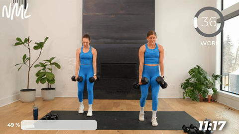 two women performing a dumbbell staggered deadlift in a 20 minute strength workout