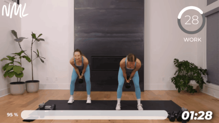 women performing dumbbell swing as part of core workout