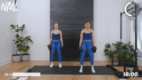 women performing a squat as part of max 20 day 1 - legs and back workout