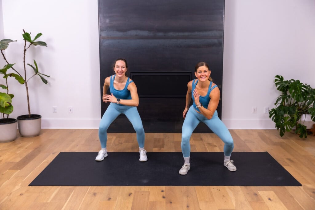 two women performing a v-walk as example of how to get steps in at home