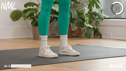 2 women performing ankle roll and calf raises as part of pre running stretches
