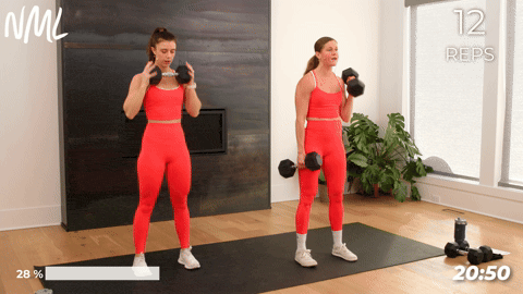 two women performing a dumbbell deadlift clean and uneven squat in a full body workout routine