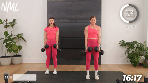 two women performing a deadlift with dumbbells.