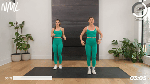 2 women performing knee hugs as part of pre running stretches