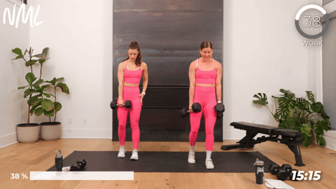 two women performing a staggered deadlift with dumbbells in a leg and chest workout at home