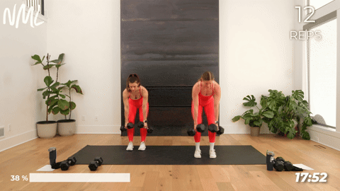 two women performing a back row clean and overhead press in a full body workout routine