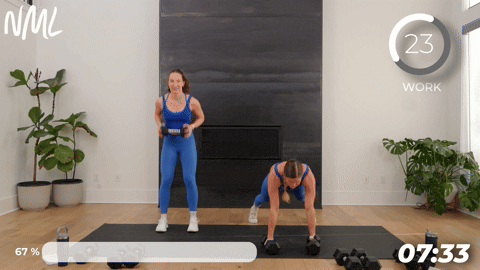 two women performing push up back rows.