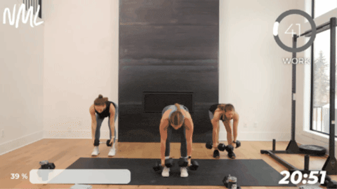group of 3 women performing deadlift clean to mimic partner drag as part of marine workout