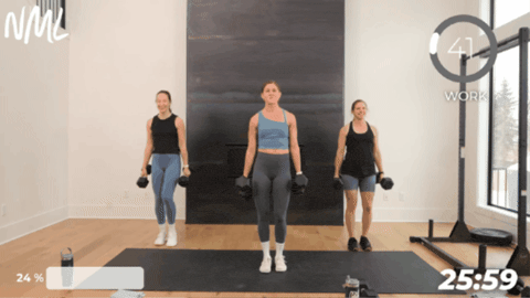 women performing a farmers carry as part of marine workout for mental toughness
