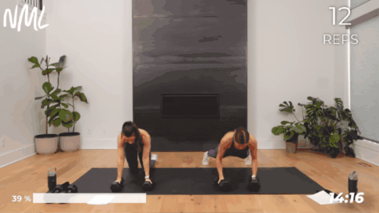 women performing a push up and back row as part of full body workout