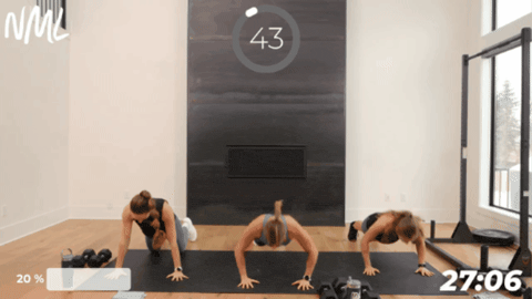 3 women performing push ups to train for marine physical fitness standards 