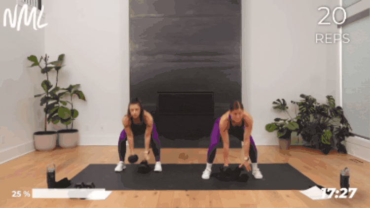 2 women performing a dumbbell squat and alternating clean as part of full body workout