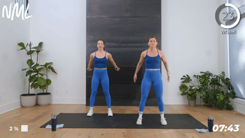 two women performing rapid air squats in a 10 minute hiit workout
