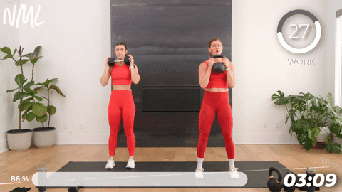 two women performing deadlift clean presses in a 20 minute kettlebell workout