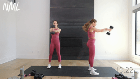 two women performing dumbbell swings in a knee friendly leg workout