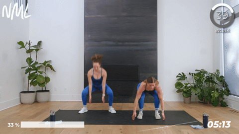 two women performing squat jumps in a 10 minute hiit workout