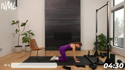 woman performing kneeling flexion as part of knee mobility exercises