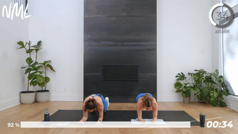 two women performing plank hold in a 10 minute hiit workout
