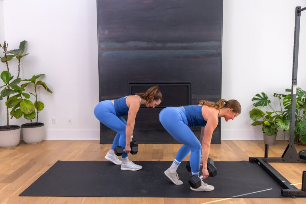 two women performing a single leg deadlift in a functional strength workout