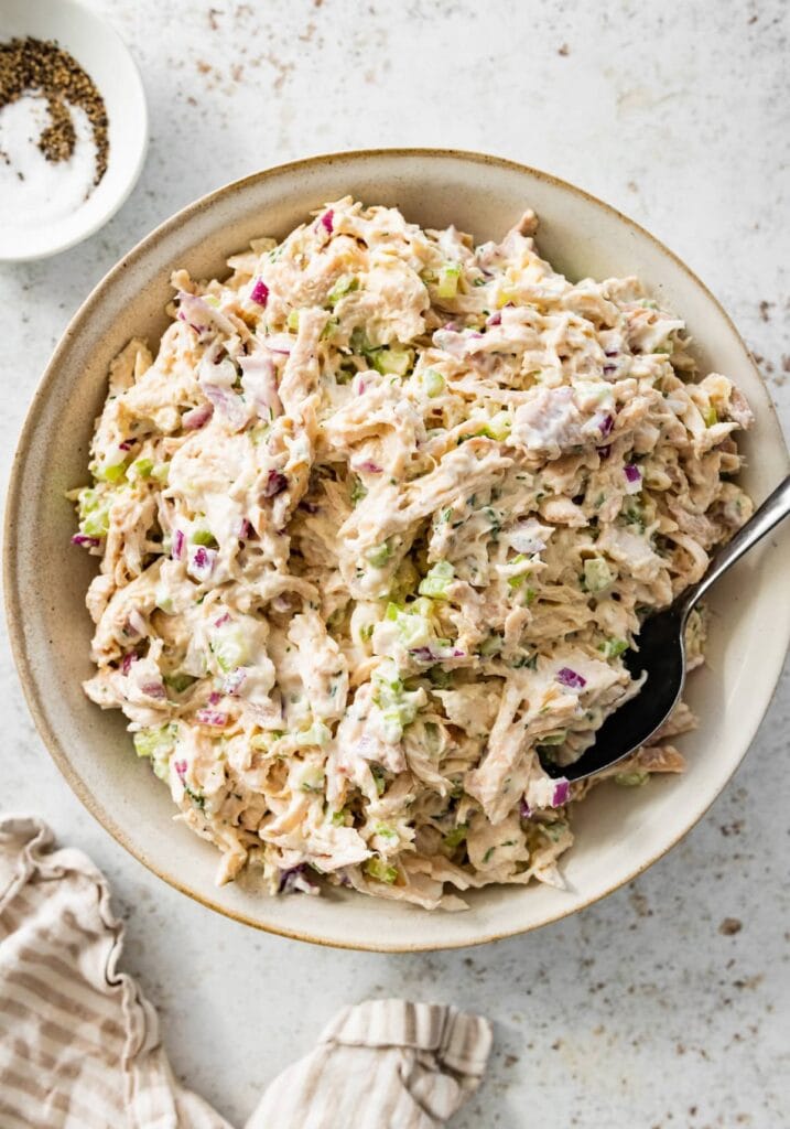 Cottage cheese chicken salad with shredded chicken, greens, celery, onion and homemade dressing.